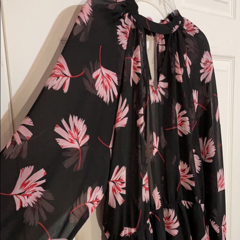 Express floral long sleeve peplum shape top Size L